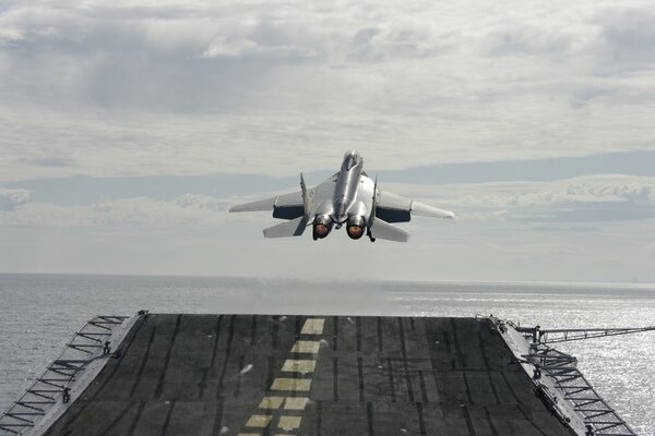 MIG-29 cube fighter takes off from an aircraft carrier