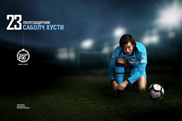 Svbodch Hust from the Zenit St. Petersburg team ties his shoelaces on the field