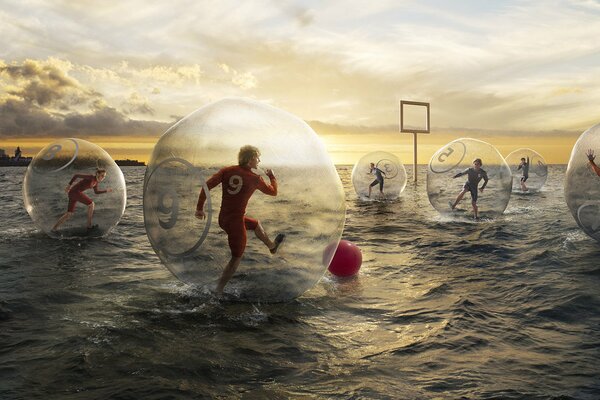 A comic match of football players on the water in balloons
