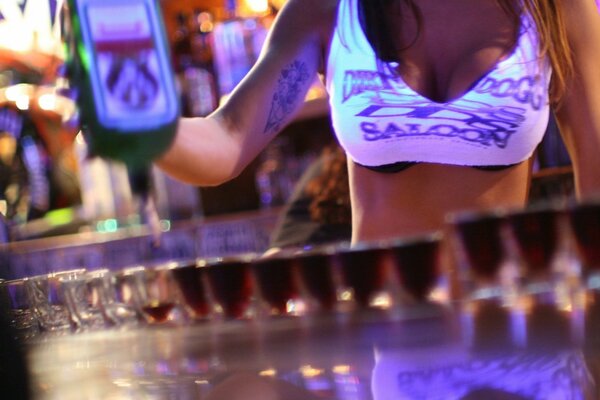 Bar counter with glasses and breasts