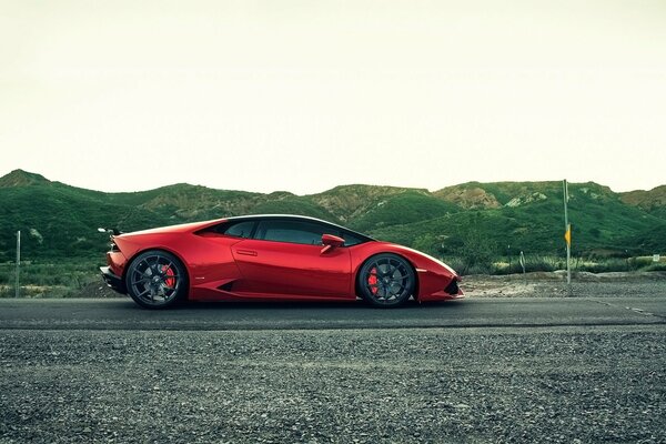 The red lamborghini is ready for a dash