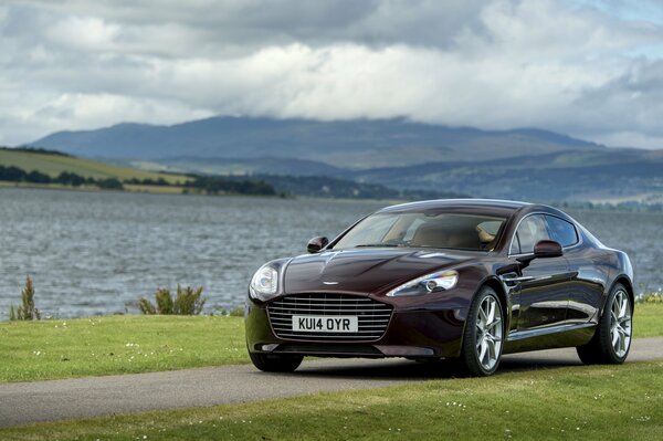 There is a gorgeous, beautiful car on the road