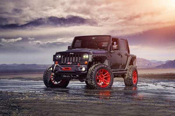 Jeep con grandi ruote per la guida fuoristrada