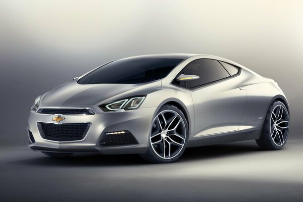 Grey modern Chevrolet 140s on a grey background