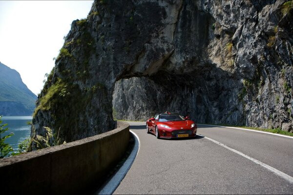 Sporty red supercar on the track