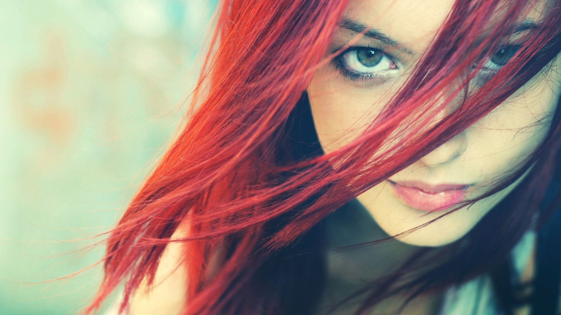 a woman girl red grey close up face