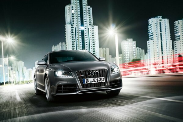 Audi rs5 gray color rides around the city