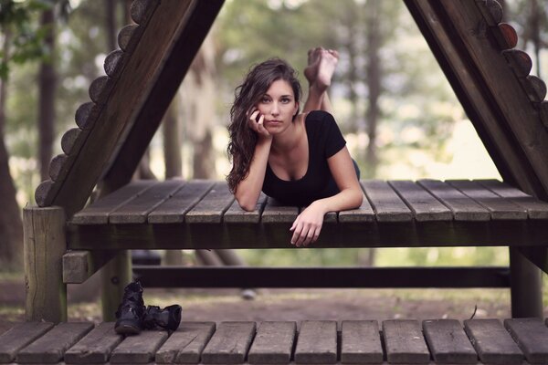 Brunette girl on the bench