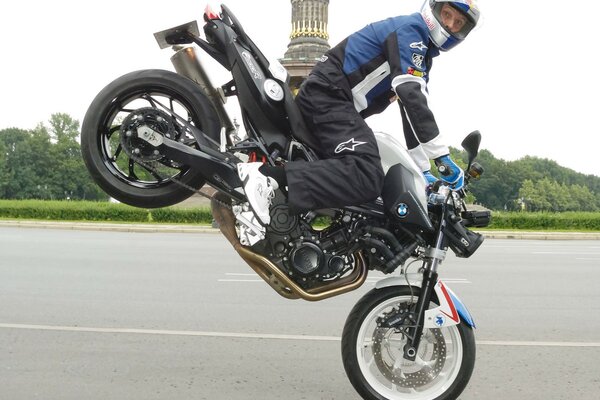 Riding a motorcycle on the front wheel