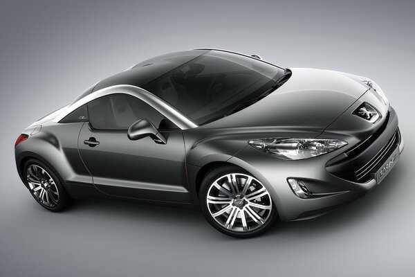 Серый спорт кар Peugeot вид сбоку