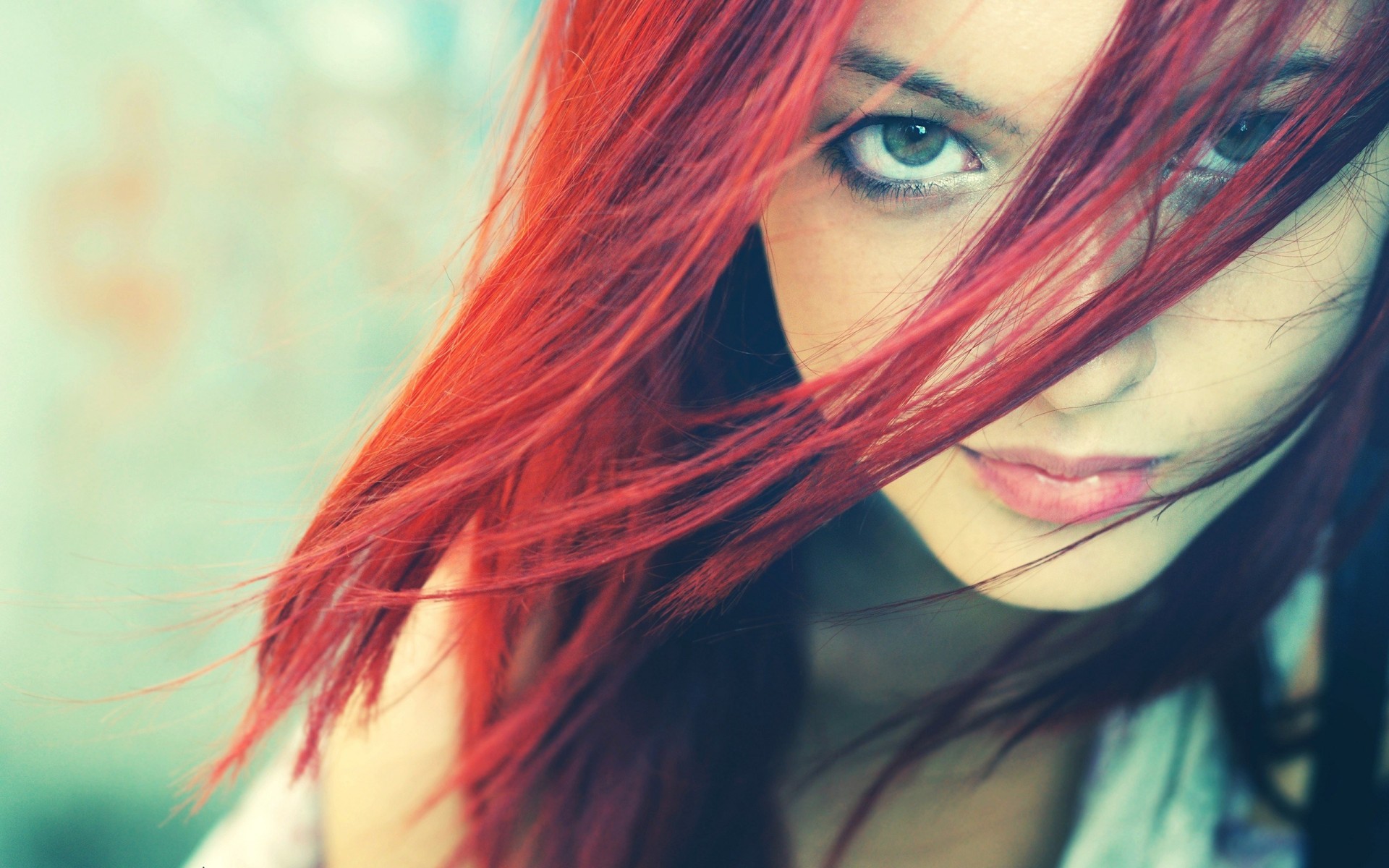 a woman girl red grey close up face