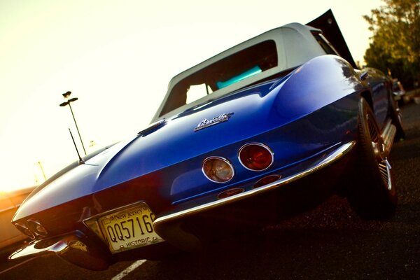 Bright blue retro car in the city center