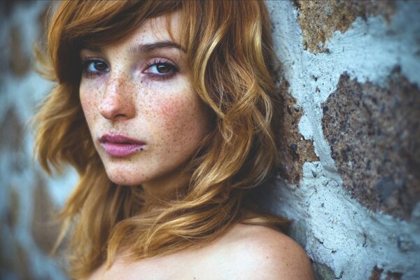 Beautiful redhead girl with freckles