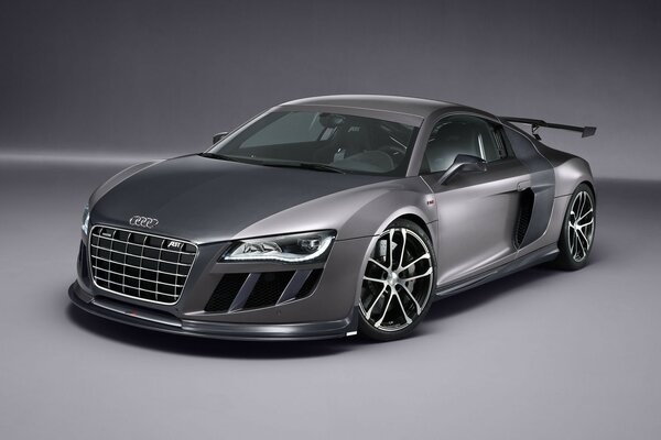Grey Audi r8 on a solid background