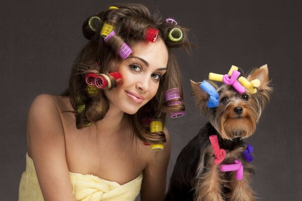 Photo of the hostess and her dog in curlers