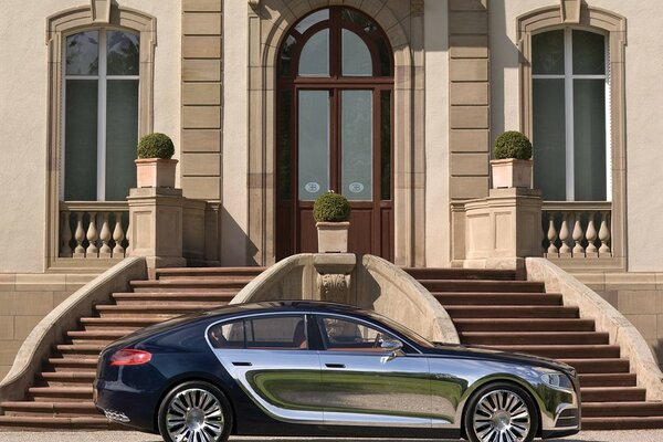 Bugatti near the big house architecture