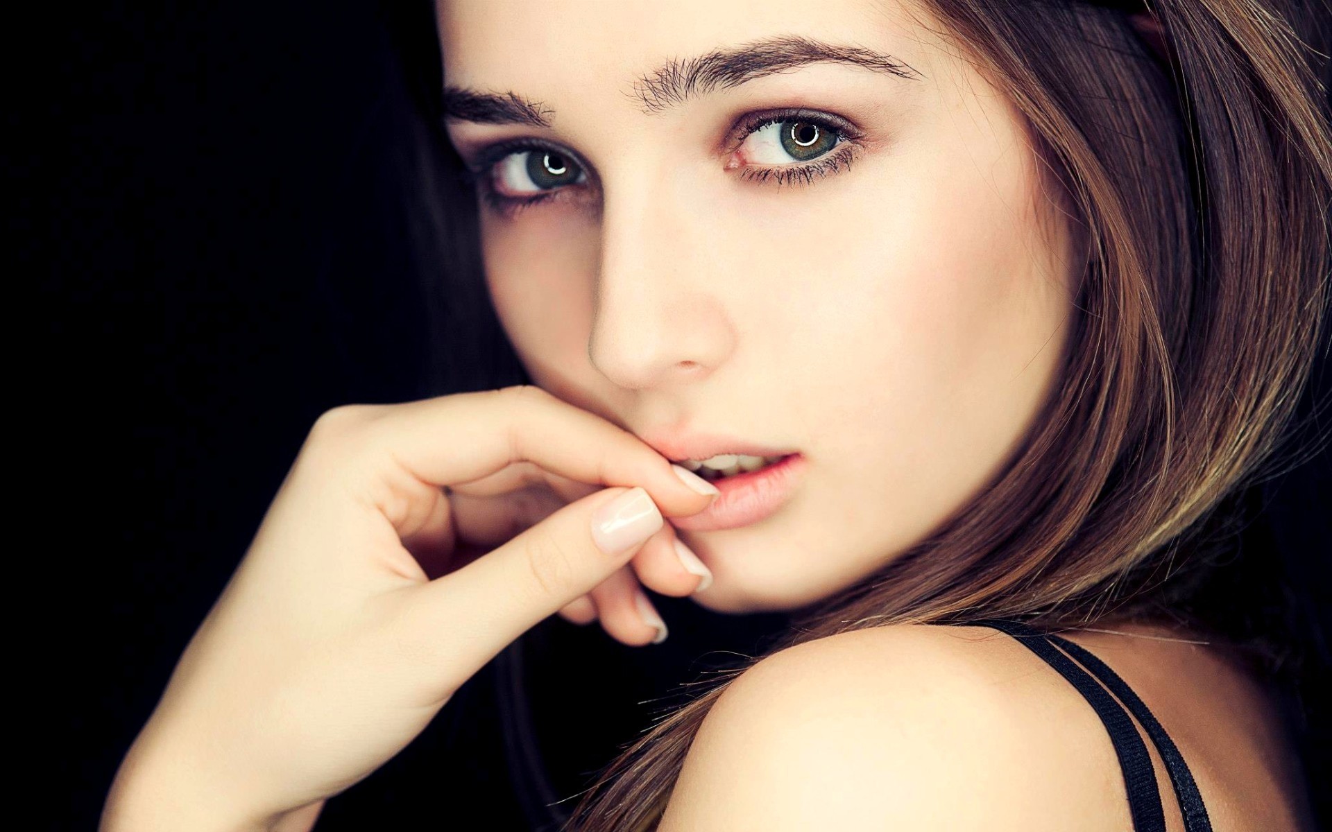 a woman girl brunette black close up face