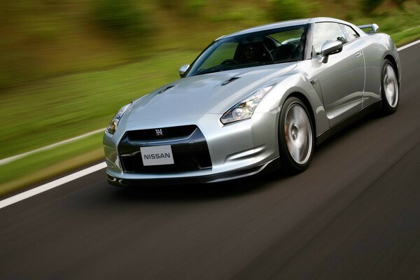 Silver nissan gt-R adds speed