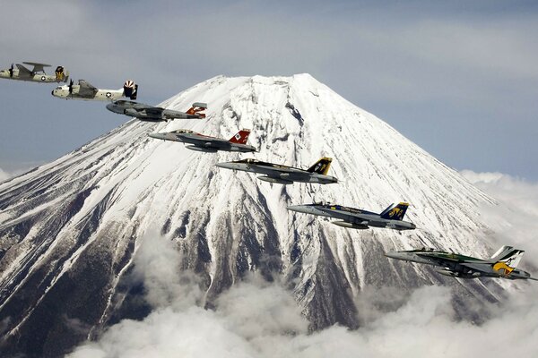 Planes are flying a mile behind the mountain