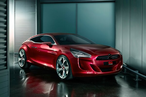 Red car in a cool garage