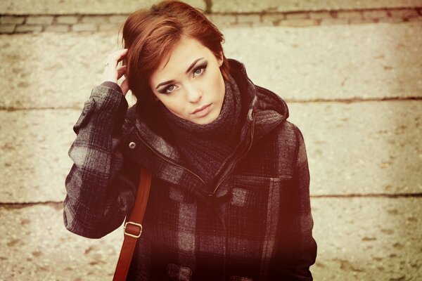 A brunette girl with gray eyes in an unusual filter