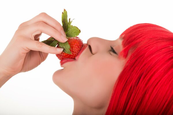 Bright girl with strawberries