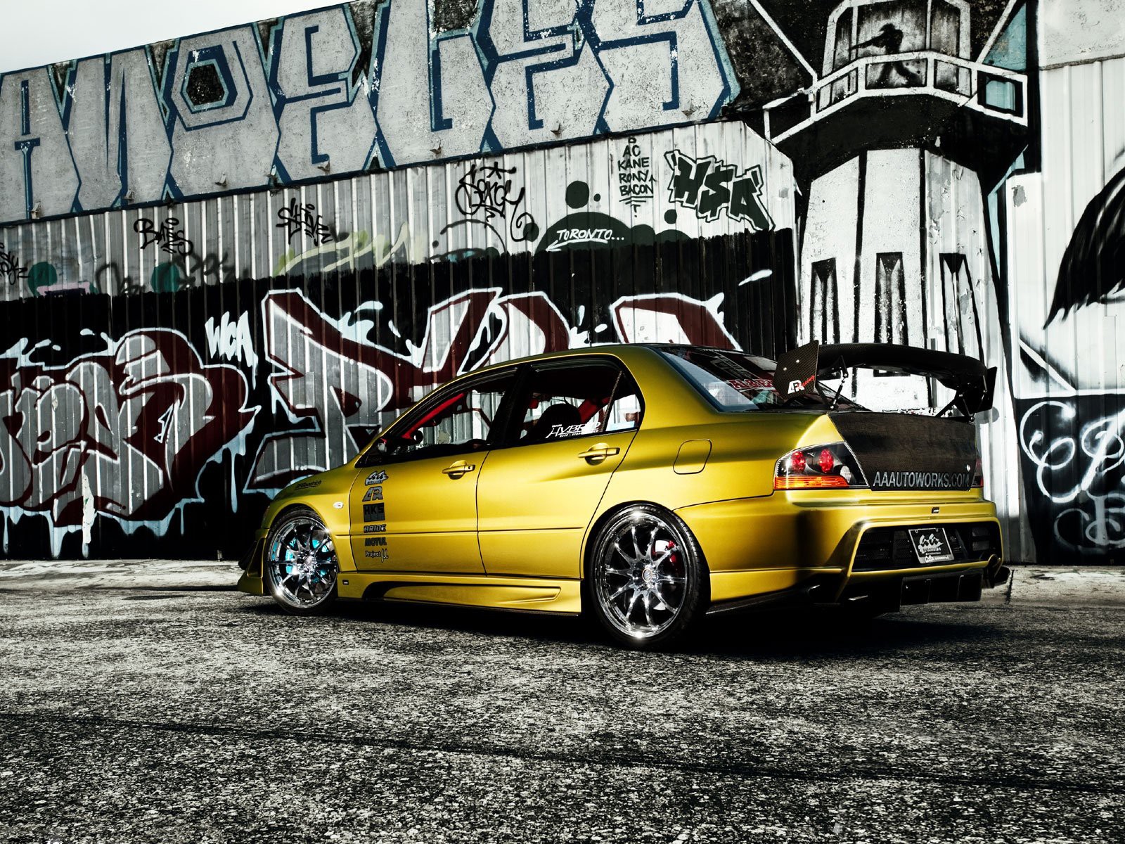 mitsubishi giallo strada grafite