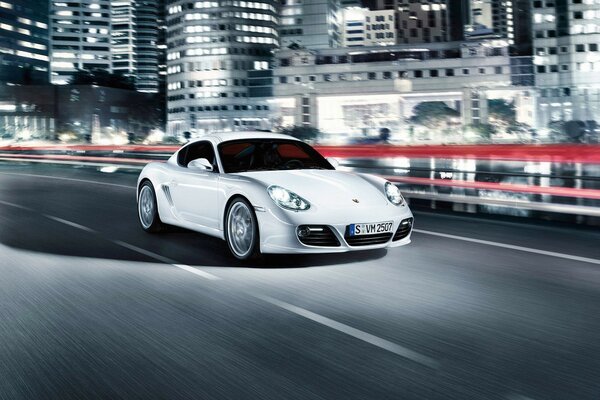 White Porsche car on a city street