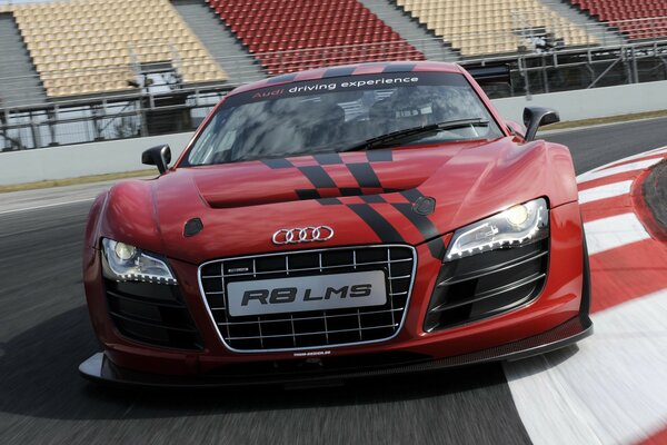 Red Audi R8LMS Car with a Checkerboard Pattern