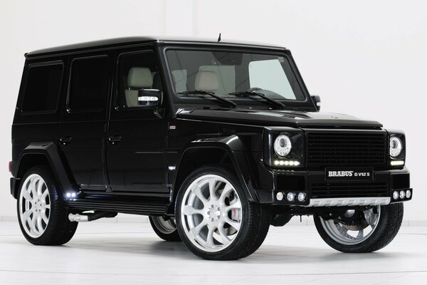 Black Mercedes jeep on white background