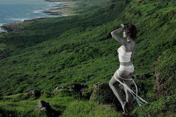 Asian woman standing on the coast in bandages