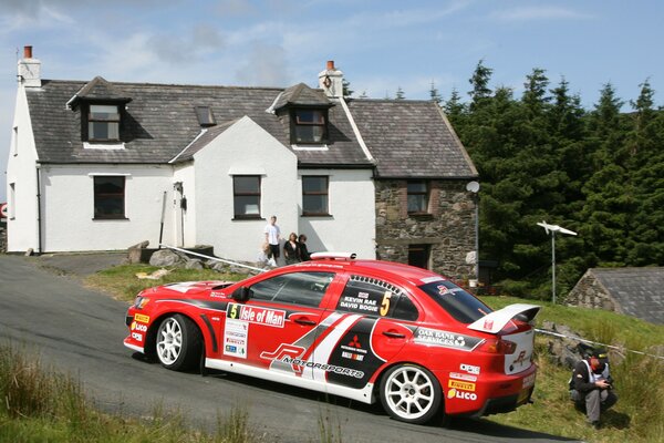 Mitsubishi sports rally in an alpine village