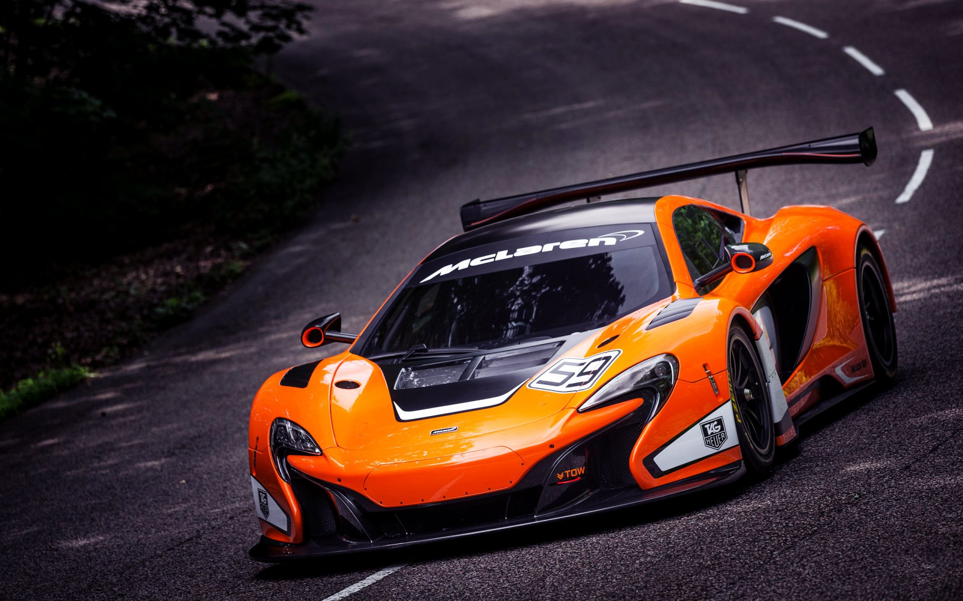 mclaren 650s gt3 auto sportiva supercar auto arancione anteriore cofano in movimento asfalto