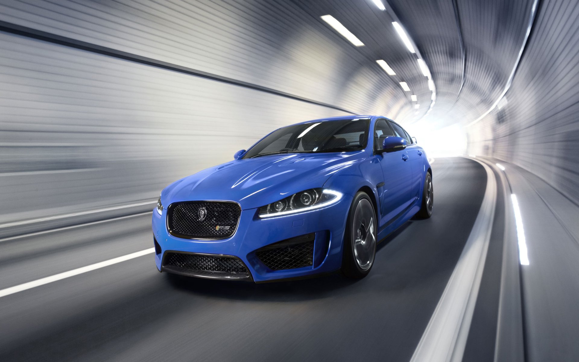 jaguar xfr-s auto jaguar niebieski przód w ruchu reflektory kaptur tunel