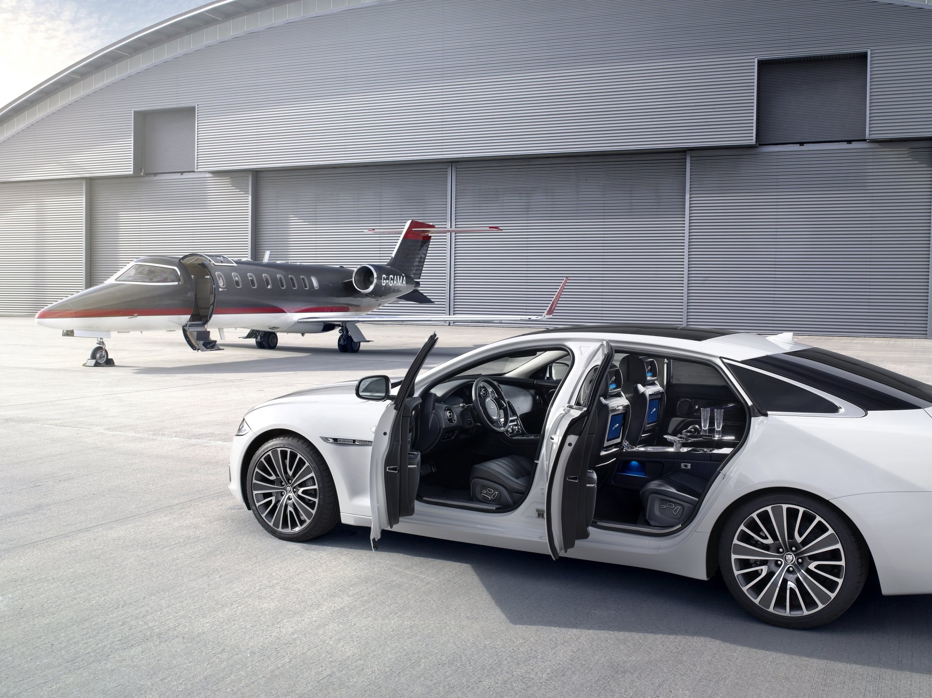 jaguar xjl ultimate white plane hangar