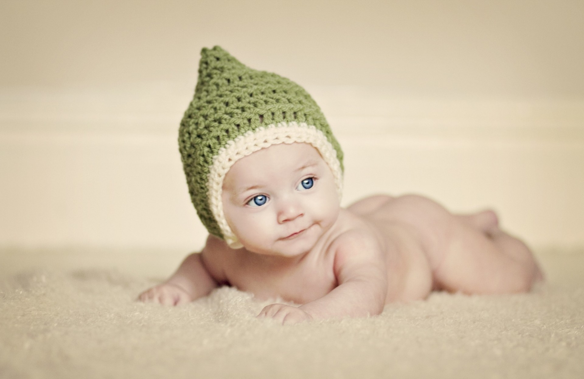 green hat child baby children knitted background uniforms eyes mood