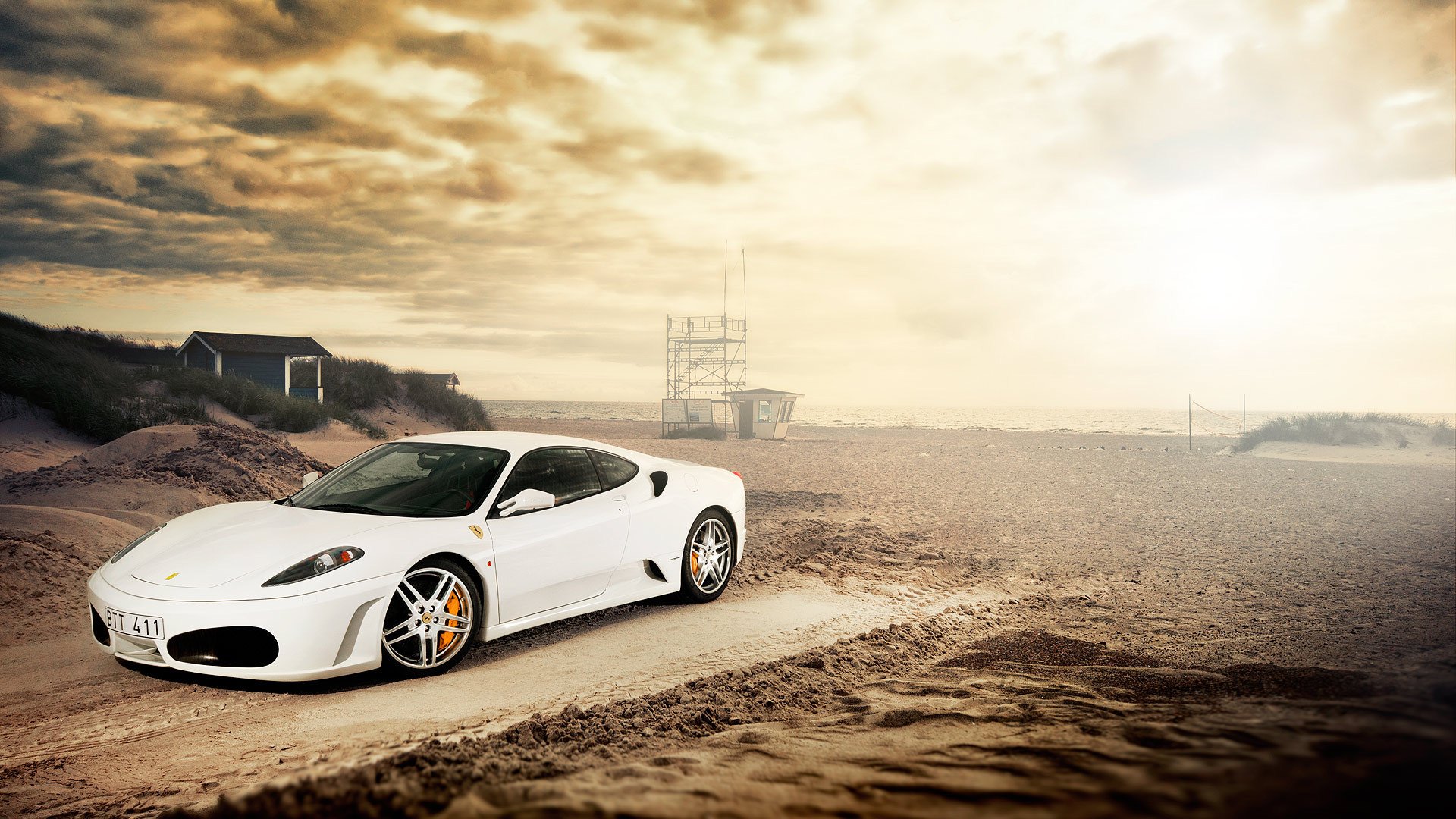 ferrari f-430 blanco frente ferrari blanco playa arena resplandor