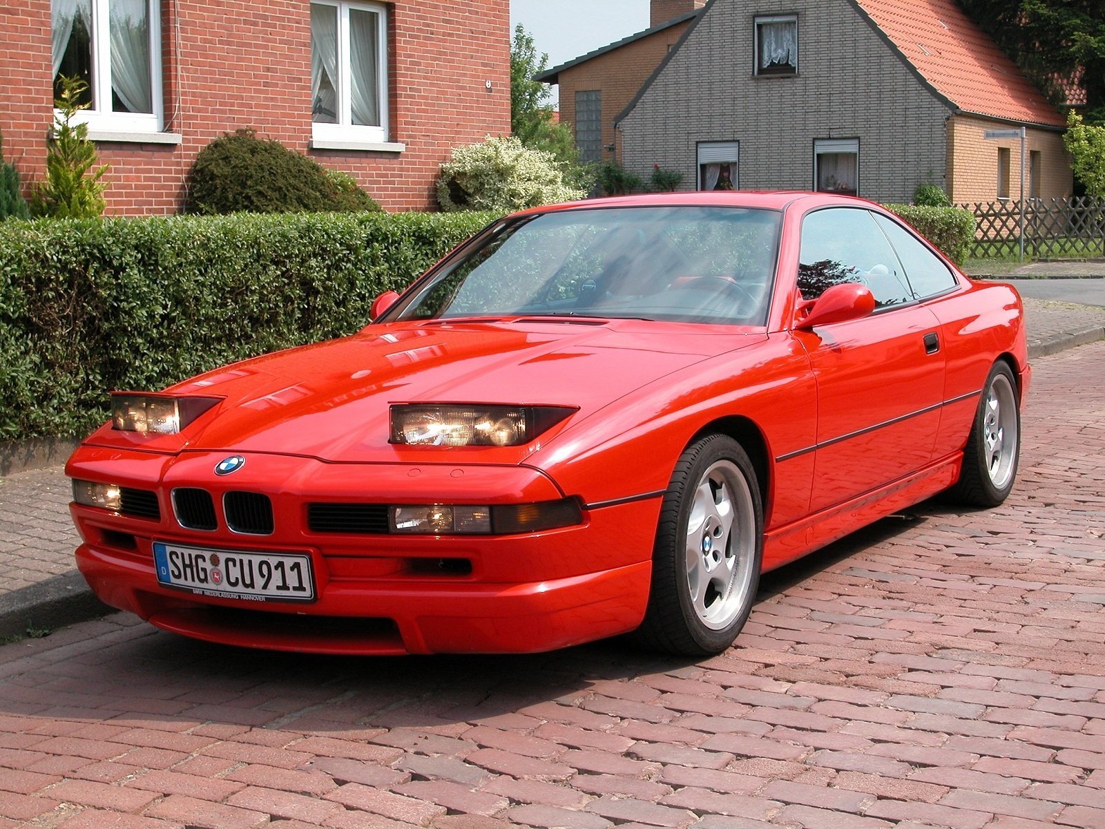 bmw 850 e31 8er bmw bmw 8er coupe sportwagen rot stil design hightech techno deutschland bayern scheinwerfer licht