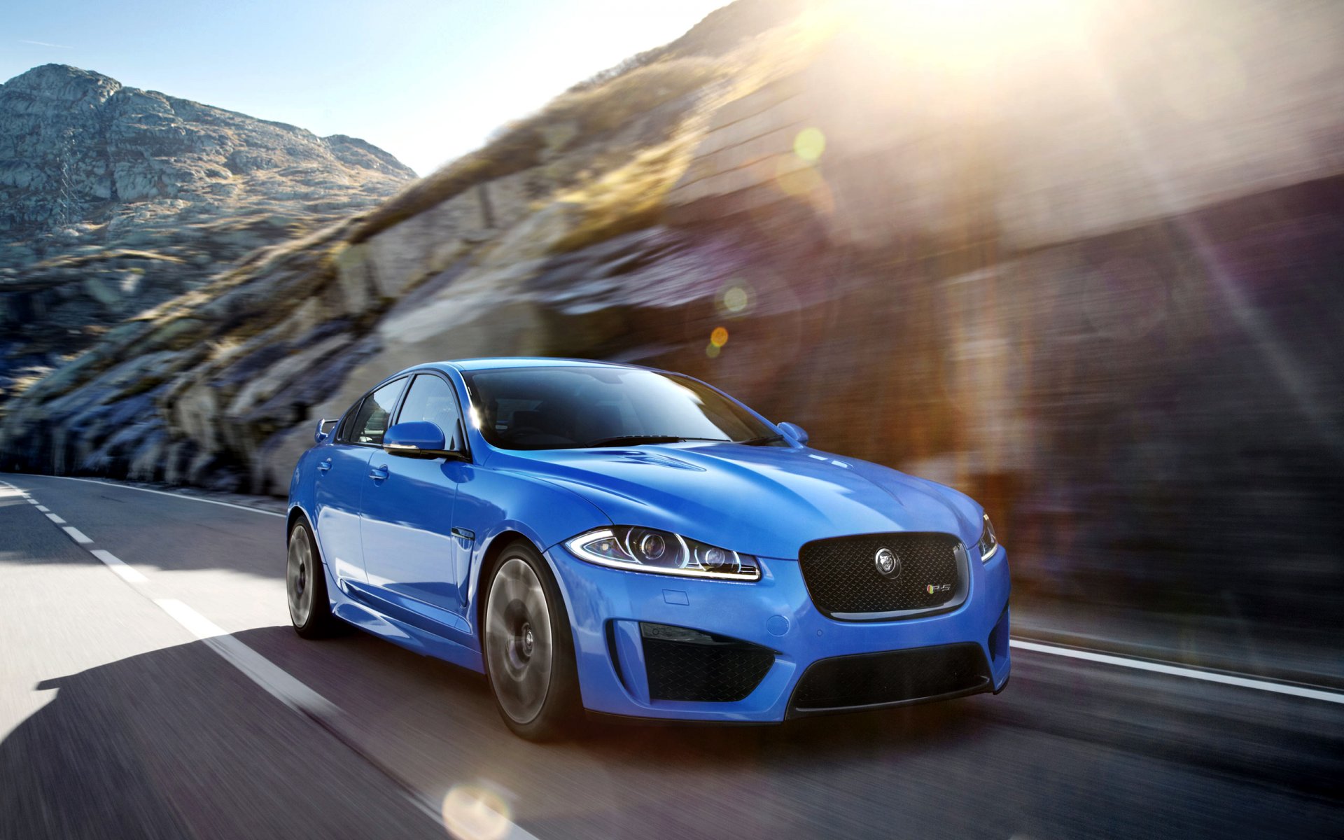 jaguar xfr-s auto jaguar car sedan blue front glare