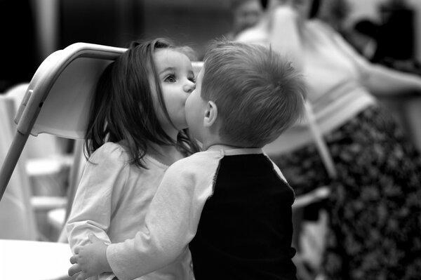 Beautiful children in love kissing