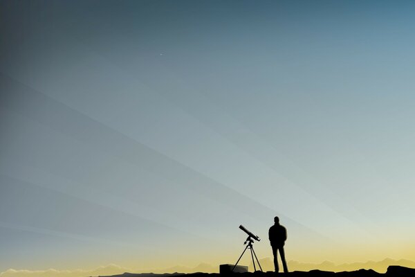 Un hombre en el horizonte se para con un telescopio