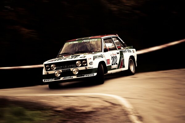 Abarth 131 enters the turn sideways at speed