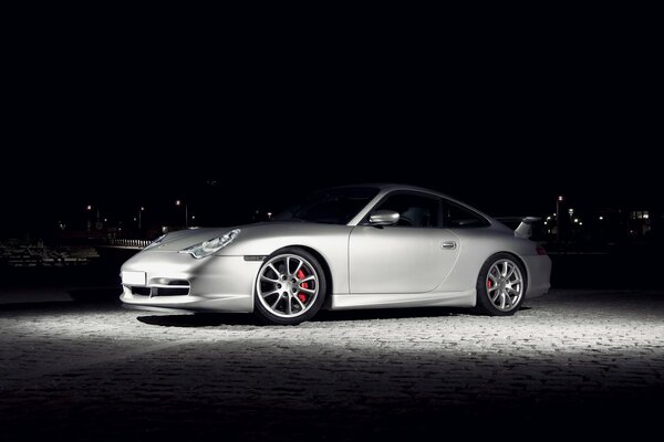 Silver Porsche 911 car at night