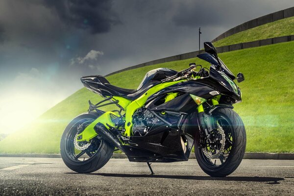 A chic sports motorcycle under the glare of the sun