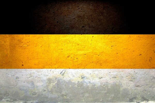 Bandera Del Imperio Ruso. Negro, amarillo y blanco en la pared