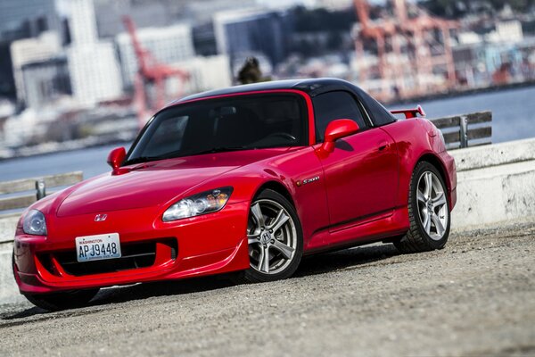 Red Honda C2000 on the embankment