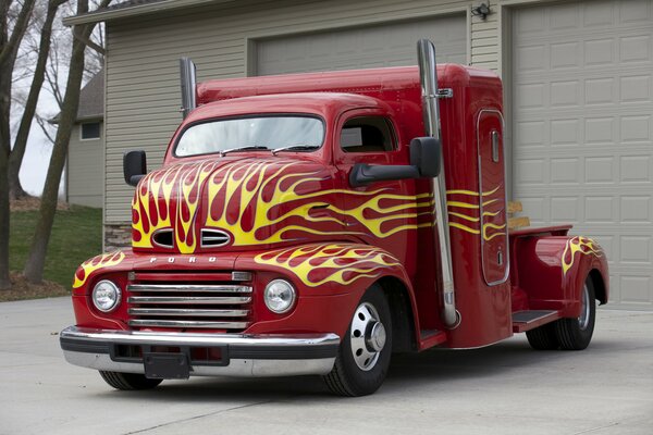 Ford 1950 full-size station wagon in red