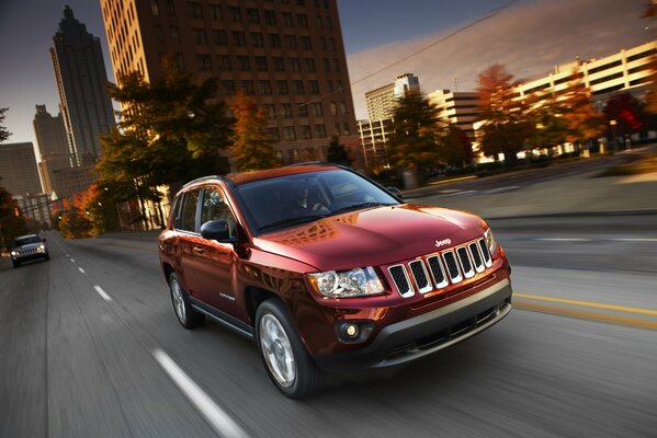 Jeep in motion on a city road