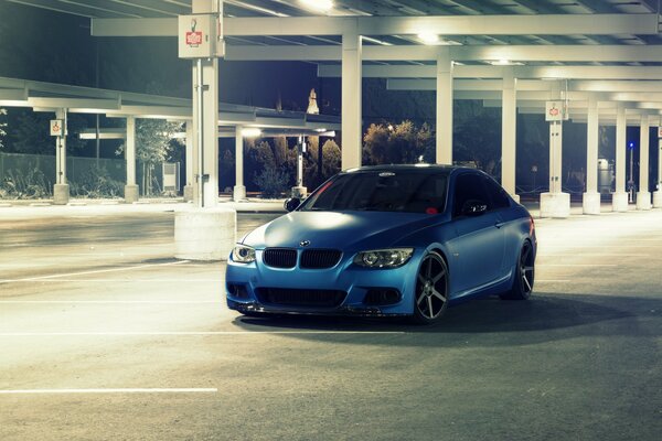 Blue BMW in the parking lot