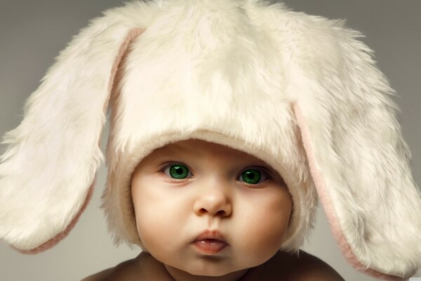 Cute baby in bunny costume